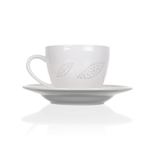 Tea cup and saucer set with petals